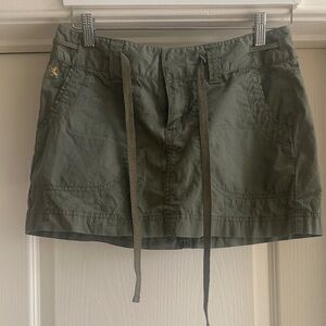 Express Army Green Mini Skirt with Drawstring, zipper, button & clasps